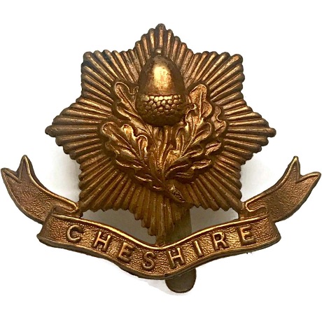 A Cheshire Regiment cap badge 1898 to the end of WW1, acorn and two leaves.